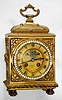 French, Desk clock in bronze/ ormolu, in the style of a Pendule d'officer, and with open escapement on the dial, 8-day, gong striking, and with the retailer's name, "J. B. MARTY, Turin" showing clearly in the dial center.