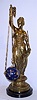 French, bronze figure of Diana with bow, from which is suspended via three chains, a ball containing the movement, which travels in a circular / conical pattern motion when running, striking on bell, c1885