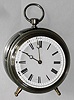 French, rare Round cased fusee carriage clock with 2-plane lever escapement, and with a cylinder of glass surrounding the movement, making it all visible. We sold the sister to this clock in 2009 for a hammer price of $1800, c1886