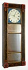 "New Hampshire Mirror Clock" timepiece, with a period stenciled mirror frame, c1840, with a purpose made rear box c1920 (has some age) and driven by a period banjo movement, c1840