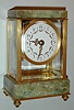 French, 8 day lever movement, marble and bronze miniature crystal regulator timepiece. c.1910