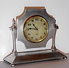 Swiss, 8 day sterling silver lever movement desk timepiece. c. 1928 This was a presentation piece, engraved on the base and reads as follows: "Queen Victoria Nursing Inst New Malden, Presented to Mrs. Bevan by the Ladies Committee as token of esteem and in recognition of her valued services as Lady President from 1897 to 1928."
