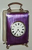 French, 8 day, guilloche violet enamel over embossed sterling silver case, lever movement travel or desk timepiece. c.1890