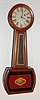 Attleboro area 8 day, weight driven banjo timepiece in mahogany case with reverse gilt glasses, c1860