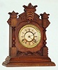 Ansonia Clock Co., New York, "Tivoli" cabinet clock 8 day time and strike spring driven movement in walnut case, c1895