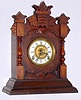 Ansonia Clock Co., New York, "Tivoli" cabinet clock 8 day spring driven time and strike movement in walnut case, c1885