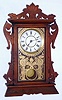 Seth Thomas Clock Co., Thomaston, Conn., "Newark" from the city series, walnut 8 day time and strike spring driven shelf clock, c1894