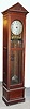 Hahl Automatic Clock Co., Chicago, Illinois, pneumatic master tall clock with 8 day or longer compound weight driven movement in paneled sides quarter sawn oak case with metal dial, c1890