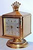 Angelus Watch Co., Switzerland desk clock and barometer with 15J stem wind stem set Angelus signed nickel movement in polished brass case with silvered metal dials and date window, c1950