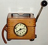 Benzing, German, oak cased pigeon-timing clock, 20th century.