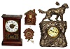 Four old dog-related 30-hour clocks.