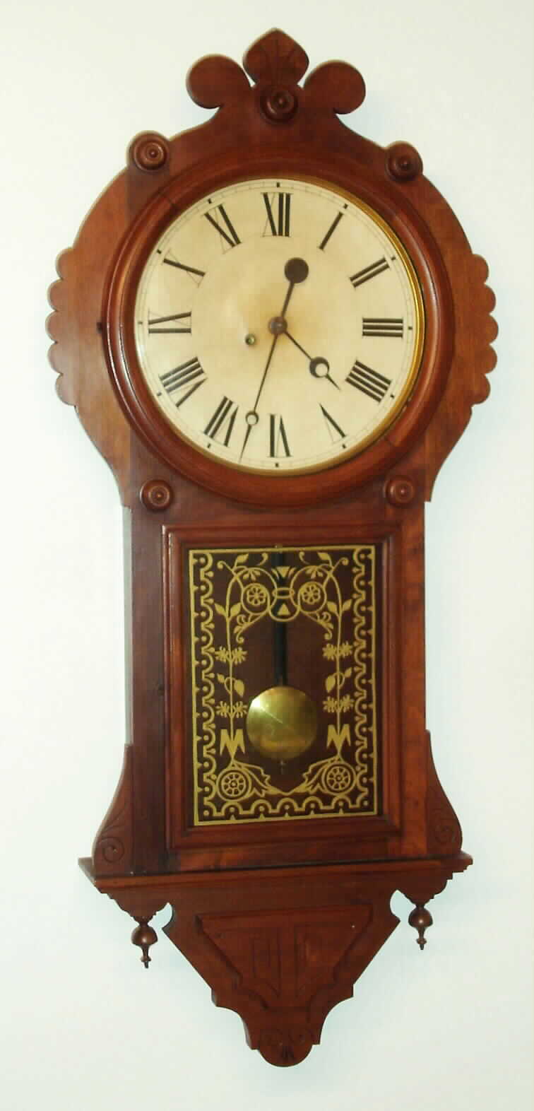F. Kroeber Clock Co., New York, "Regulator No. 41", walnut cased timepiece with 8 day, time only, spring driven with 14" painted metal dial, c1881 — Antique Clocks Price Guide