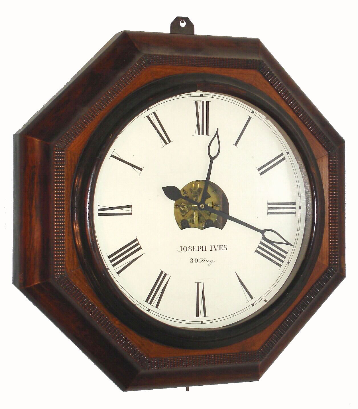 Atkins Clock Co., Bristol, Conn, 30 day, Wagon Spring wall timepiece, a large octagonal case with rosewood veneer and ripple molding accents, and with an old repair label from C R Smith and Son, corner Market and 18th St, Philadelphia, label showing repair on March 6, 1891, and perhaps the original sale in 1862, c1860 — Antique Clocks Price Guide