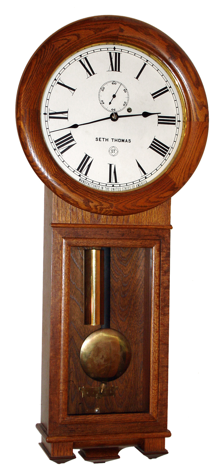 Seth Thomas Clock Co., Thomaston, Conn., "Regulator No. 2" reissue wall clock, 8 day time only weight driven oak case, serial number 418 of 4000, dated 1977. — Antique Clocks Price Guide
