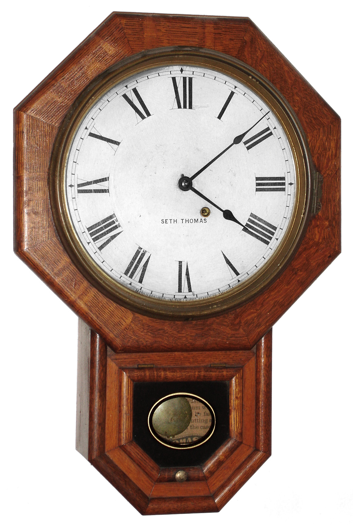 Seth Thomas Clock Co., Thomaston, Conn., "Drop Octagon 12" oak time only school clock, c1900 — Antique Clocks Price Guide