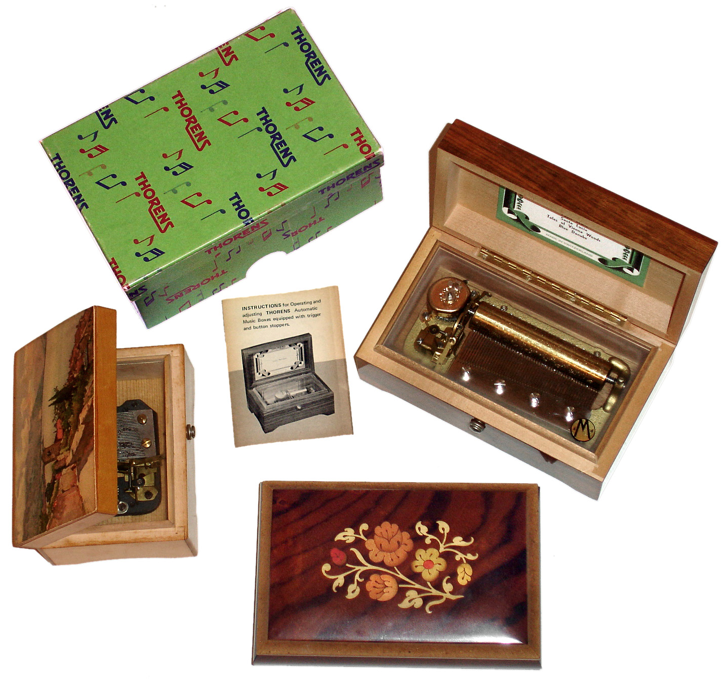 Music boxes- 3 (Three) small modern wooden box players, two Swiss Thorens and one Italian Intarsitalia — Antique Clocks Price Guide