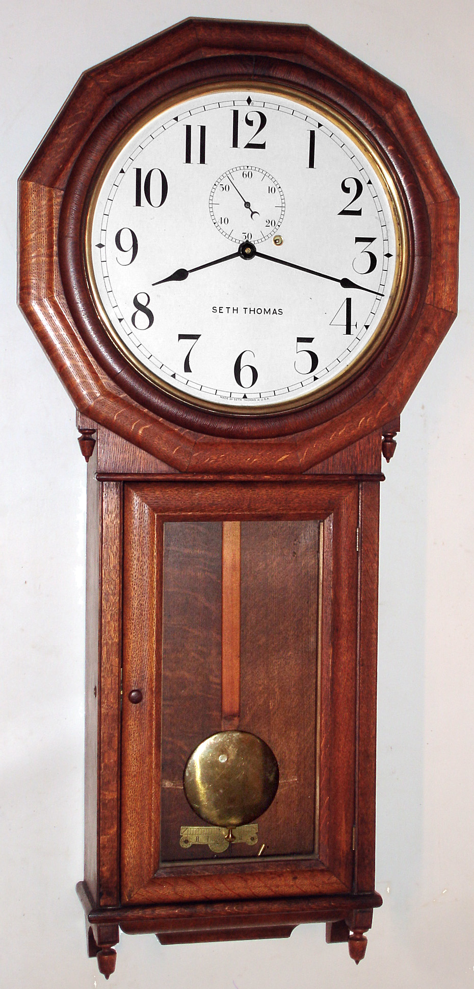 Seth Thomas Clock Co., Thomaston, Conn., "Regulator No. 3" oak weight driven time only wall clock, c1890 — Antique Clocks Price Guide