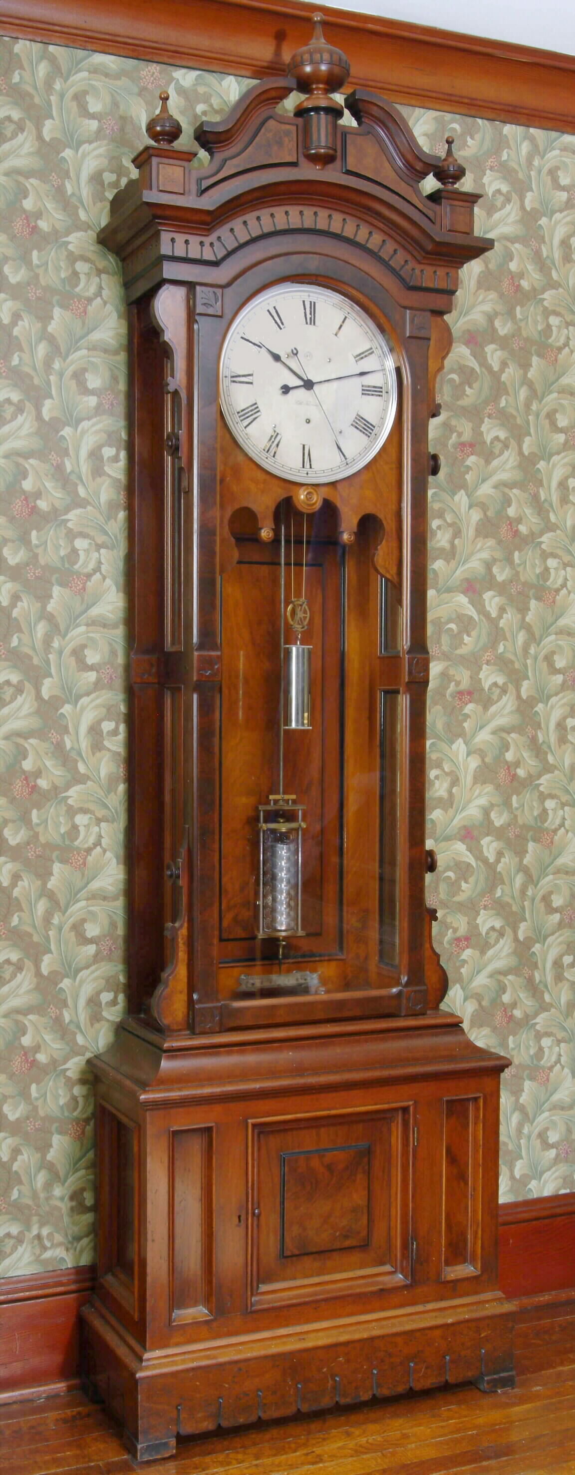 Seth Thomas Clock Co., Thomaston, Conn, "REGULATOR No. 14", floor standing jeweler's regulator in walnut, with mercurial compensated pendulum, hinged storage in base, and with center sweep seconds hand, from the Bob Wasserman collection, c1892 (dated), No. 170. — Antique Clocks Price Guide