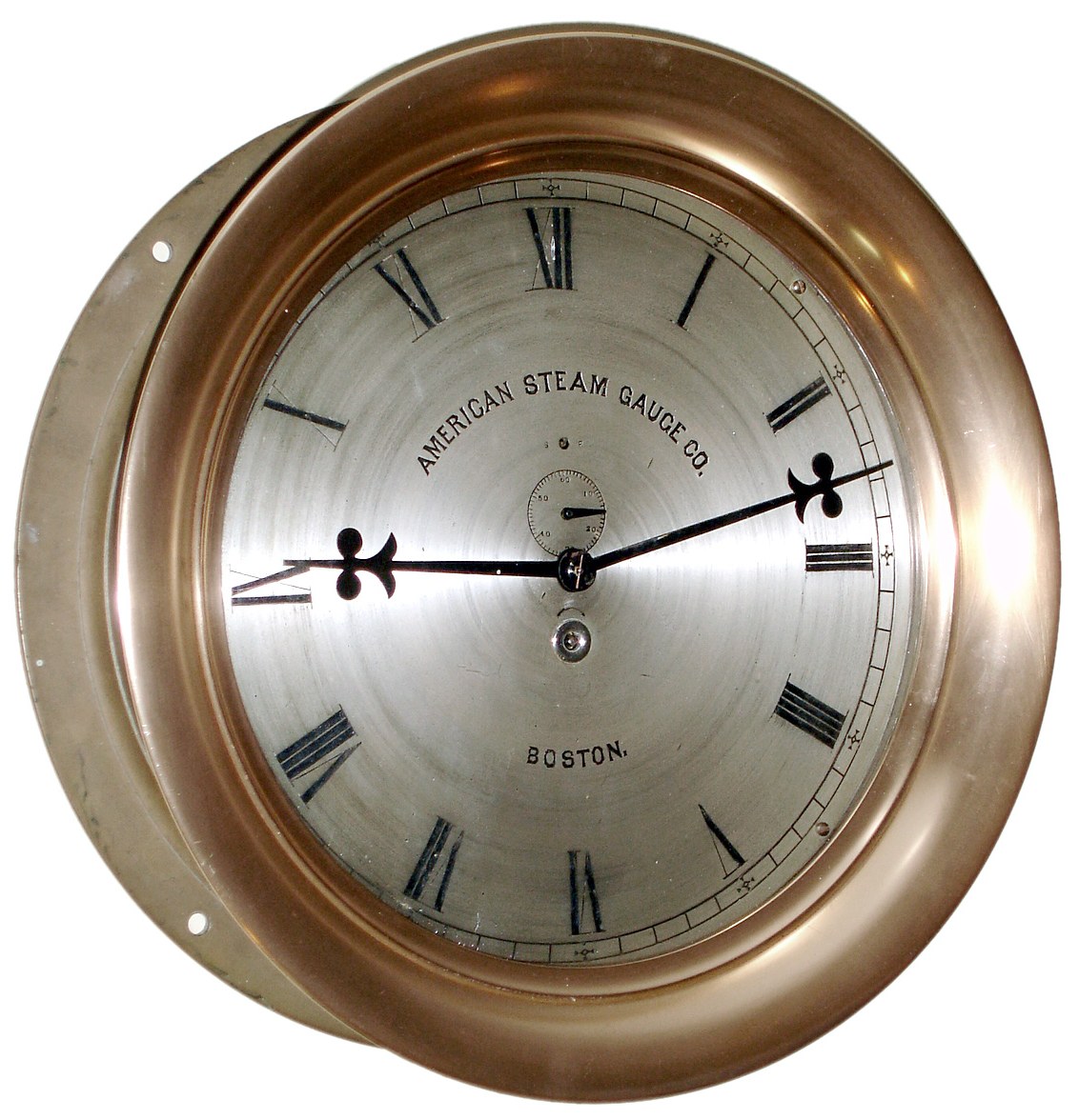 E. Howard and Co., Boston, Mass., "No. 69 Marine or Locomotive Clock" for the American Steam Gauge Co., Boston, 8 day, time only, spring driven movement with lever escapement in brass case with 12" silvered dial signed with s#116111, c1889 — Antique Clocks Price Guide