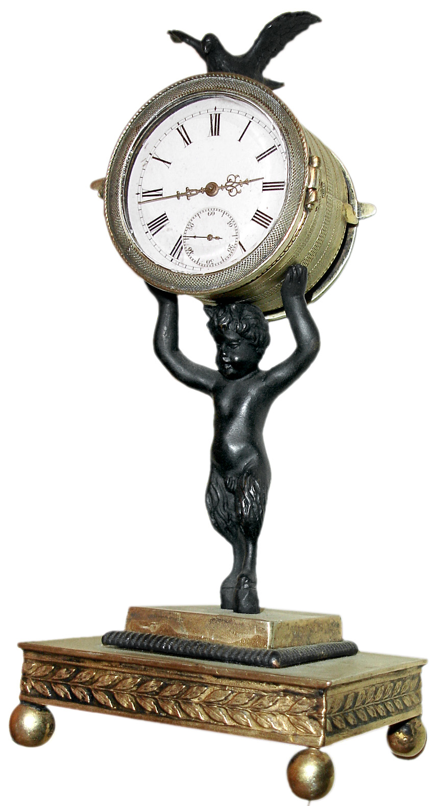 French figural desk clock with 30 hour Swiss pocket watch bar movement in a brass case with spelter figure of "Puck" or goat boy, and bird perched on top all resting on four ball feet, c1875 — Antique Clocks Price Guide