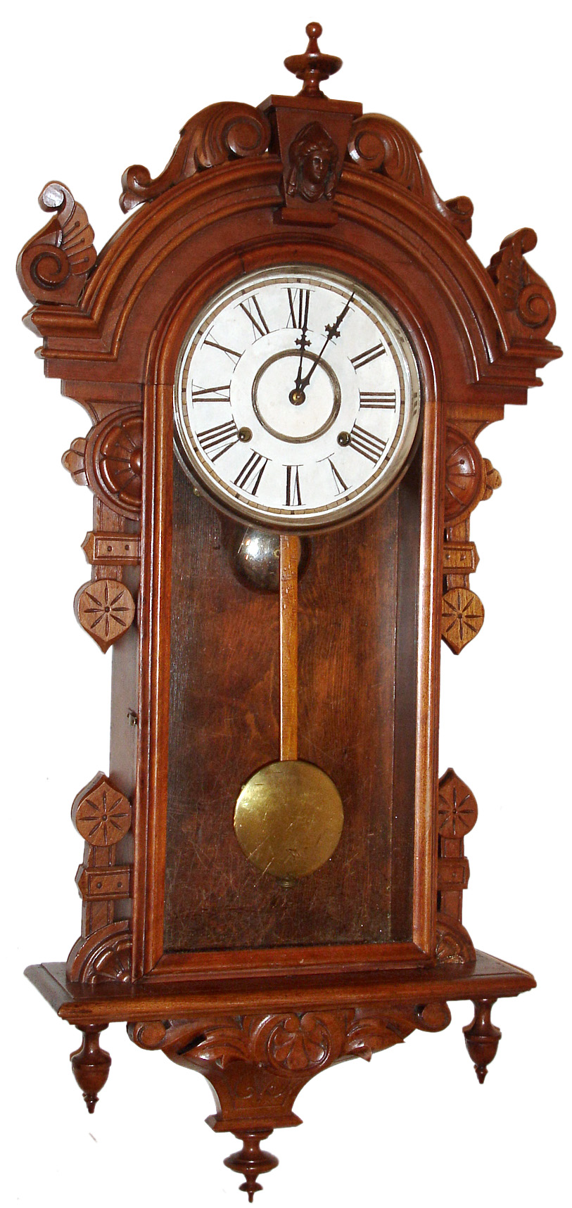 Wm. Gilbert and Co., Winsted, Conn. "Columbia" wall clock, 8 day, time and strike, spring driven movement in a walnut case with painted metal dial, c1901 — Antique Clocks Price Guide