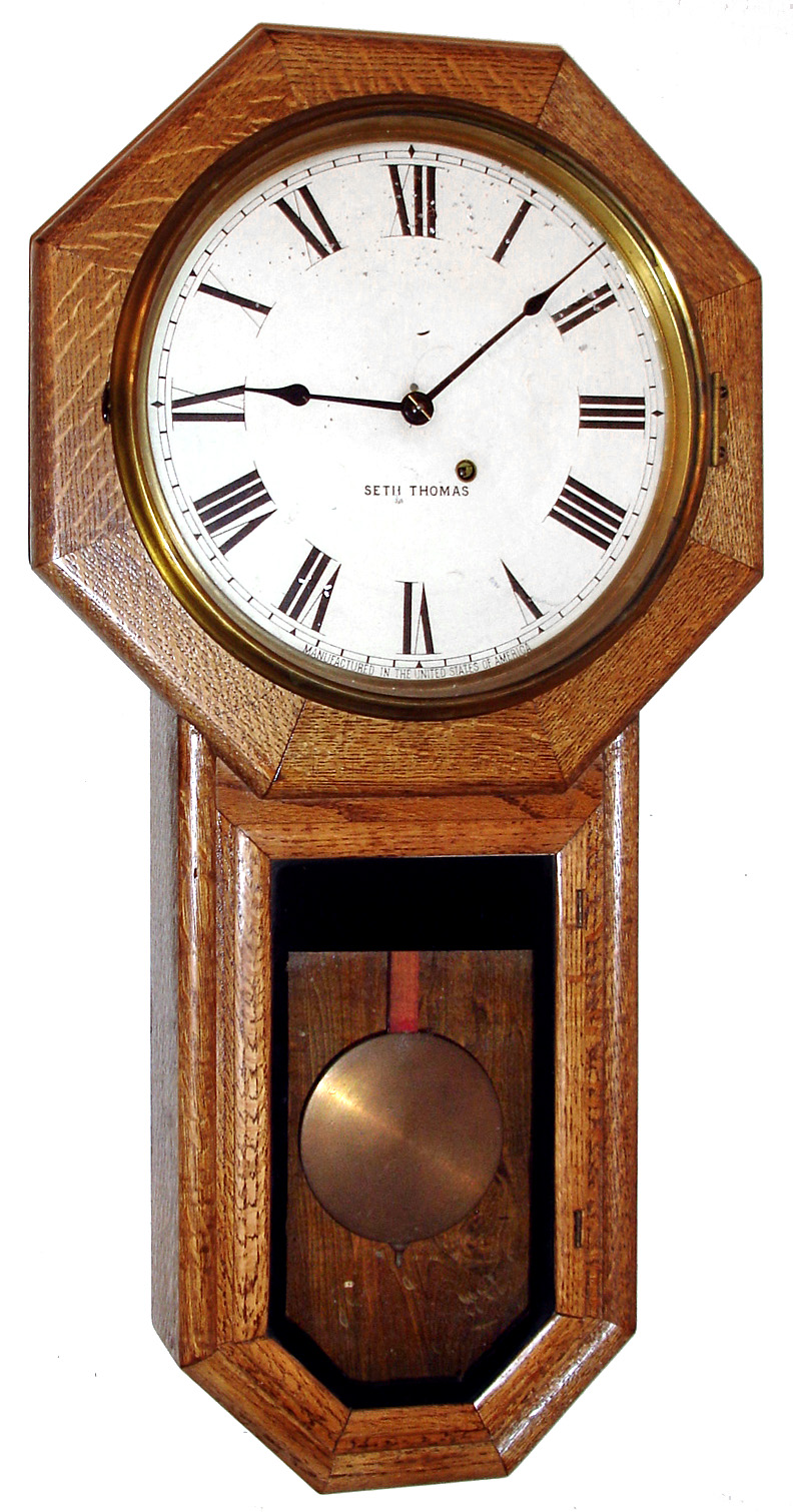 Seth Thomas Clock Co., Thomaston, Conn., "Globe" wall time piece, 8 day, time only, spring driven movement in oak case with painted metal dial, c1900 — Antique Clocks Price Guide