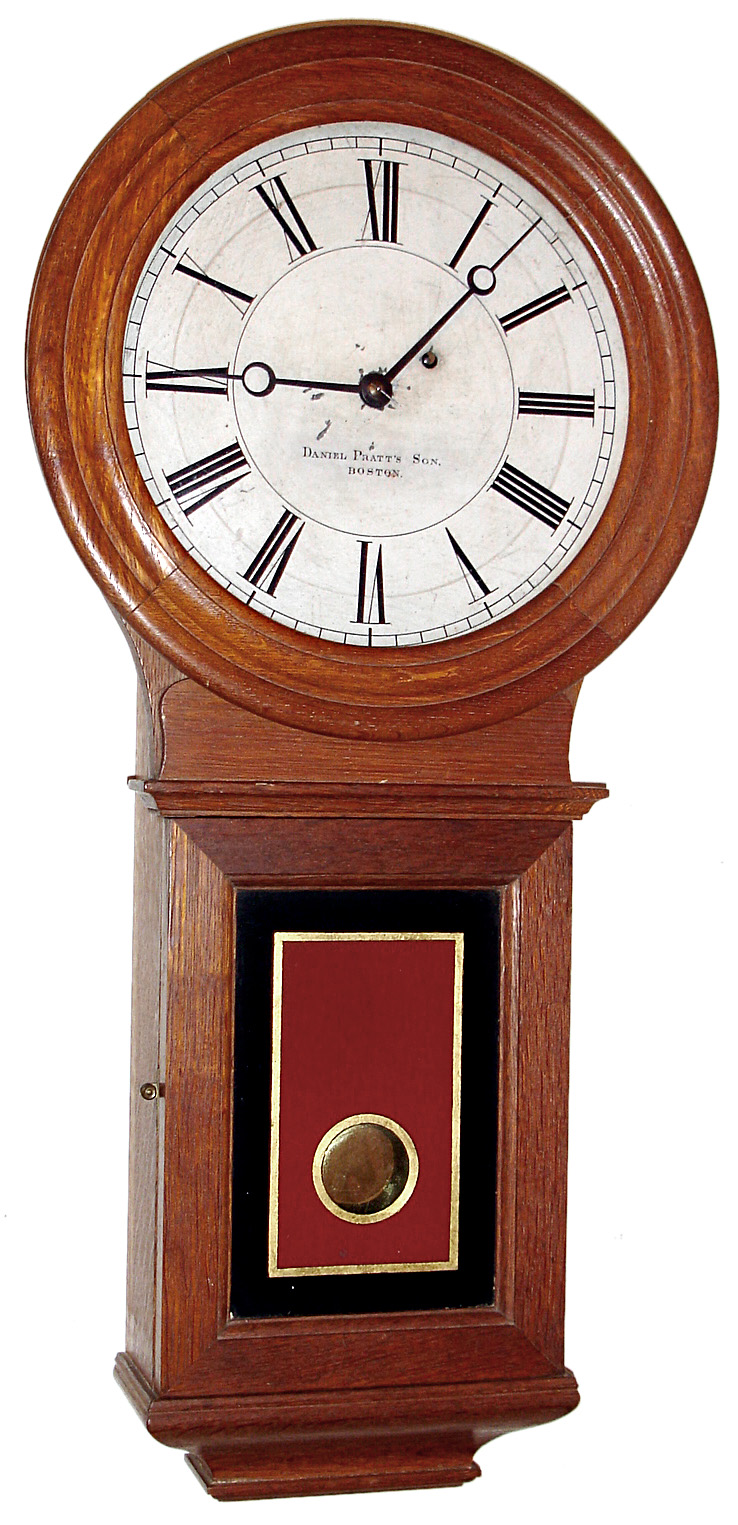Eastman Clock Co., Boston retailed by Daniel Pratt's Son, Boston wall time piece, 8 day, time only, weight driven movement in an oak case with painted metal dial, serial number 754, c1886 — Antique Clocks Price Guide