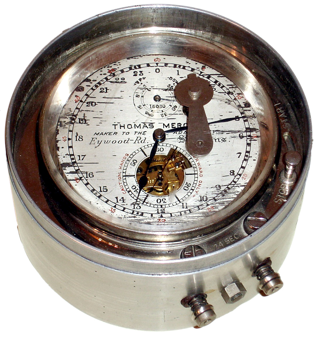 Thomas Mercer, Eyood Rd, St. Albans, Great Britain marine chronometer, 2 day, time only, spring driven movement with Earnshaw spring detent escapement in a nickel plated housing with silvered dial. This is a very unusual and scarce model with electrical contacts to drive slave units, a start / stop mechanism to regulate exposed balance and a nickel plated keyhole cover, s#15030 c1939 — Antique Clocks Price Guide