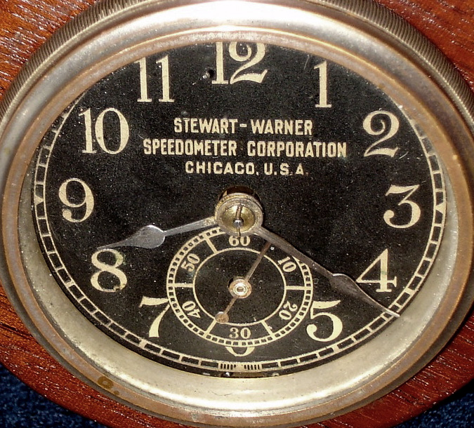 Chelsea Clock Co., Boston, Mass., time piece for Stewart-Warner Speedometer Corporation, Chicago, U.S.A., 8 day, time only spring driven movement now housed in a mahogany gimbaled case, s#90695, movement c1913 — Antique Clocks Price Guide