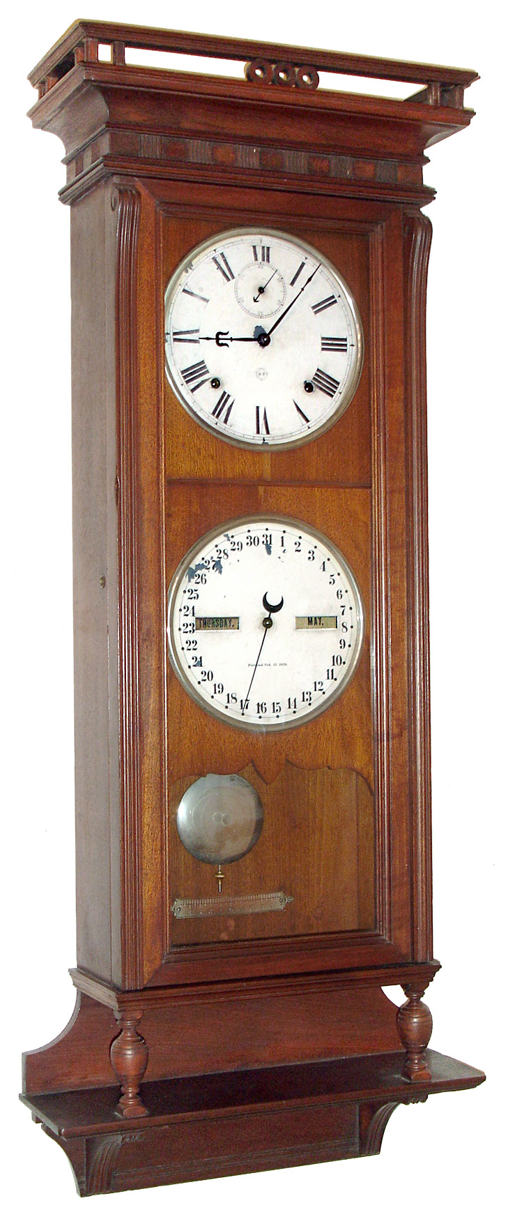Seth Thomas Clock Co., Thomaston, Conn., "Suez" perpetual calendar wall clock, 8 day, time and strike, spring driven movements in a walnut case with painted metal double dial, c1886 — Antique Clocks Price Guide