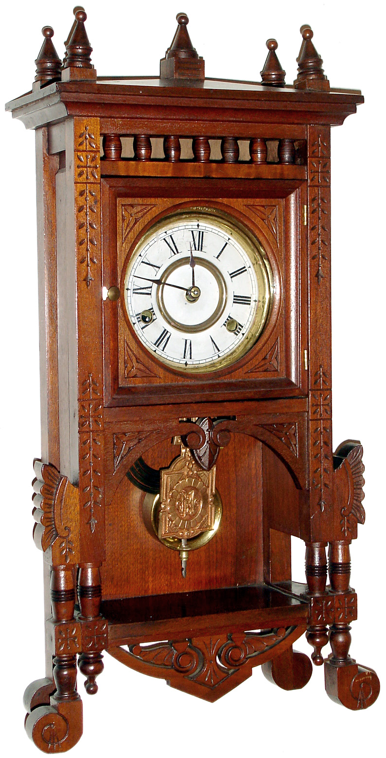New Haven Clock Co., New Haven, Conn., "Adige", 8 day, time and strike, walnut cabinet mantel clock, c1886 — Antique Clocks Price Guide