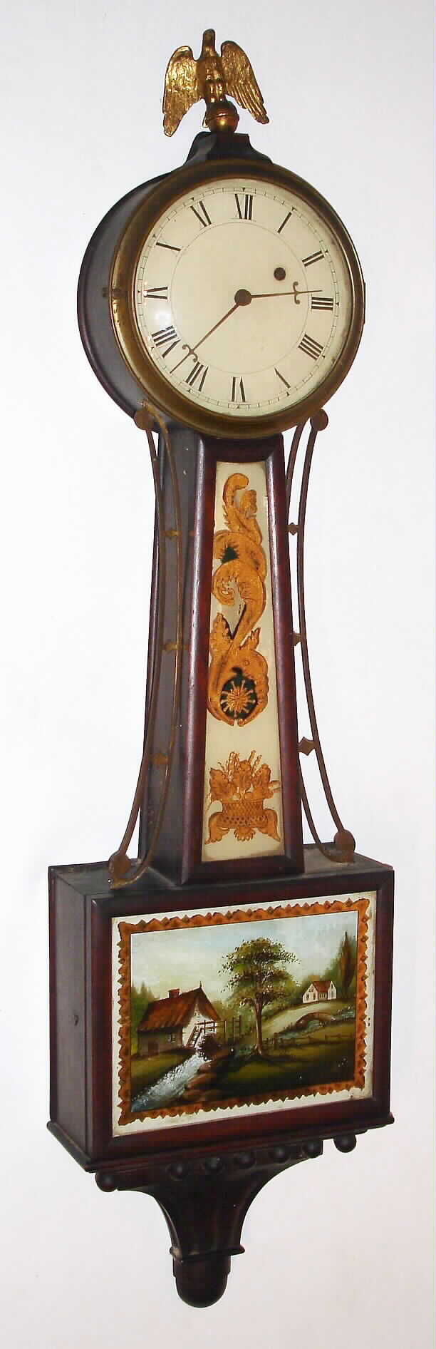 Eastman Clock Co., Boston, 8 day, banjo or Patent timepiece. Eastman later became the Boston Clock Co. and still later the Chelsea Clock Co, c1890. — Antique Clocks Price Guide