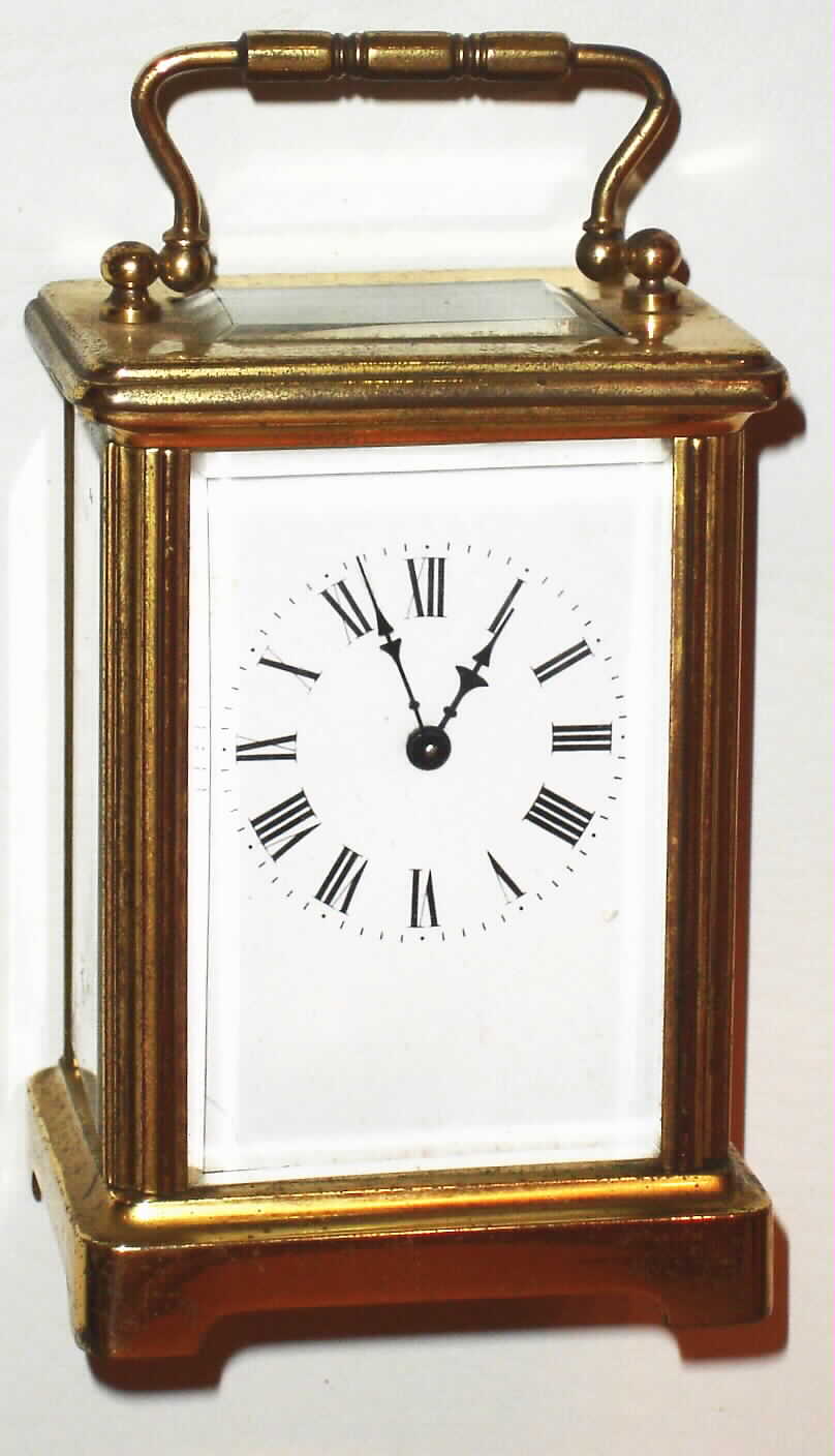 French 8 day time only brass and beveled glass Corniche style carriage clock, c1900 — Antique Clocks Price Guide
