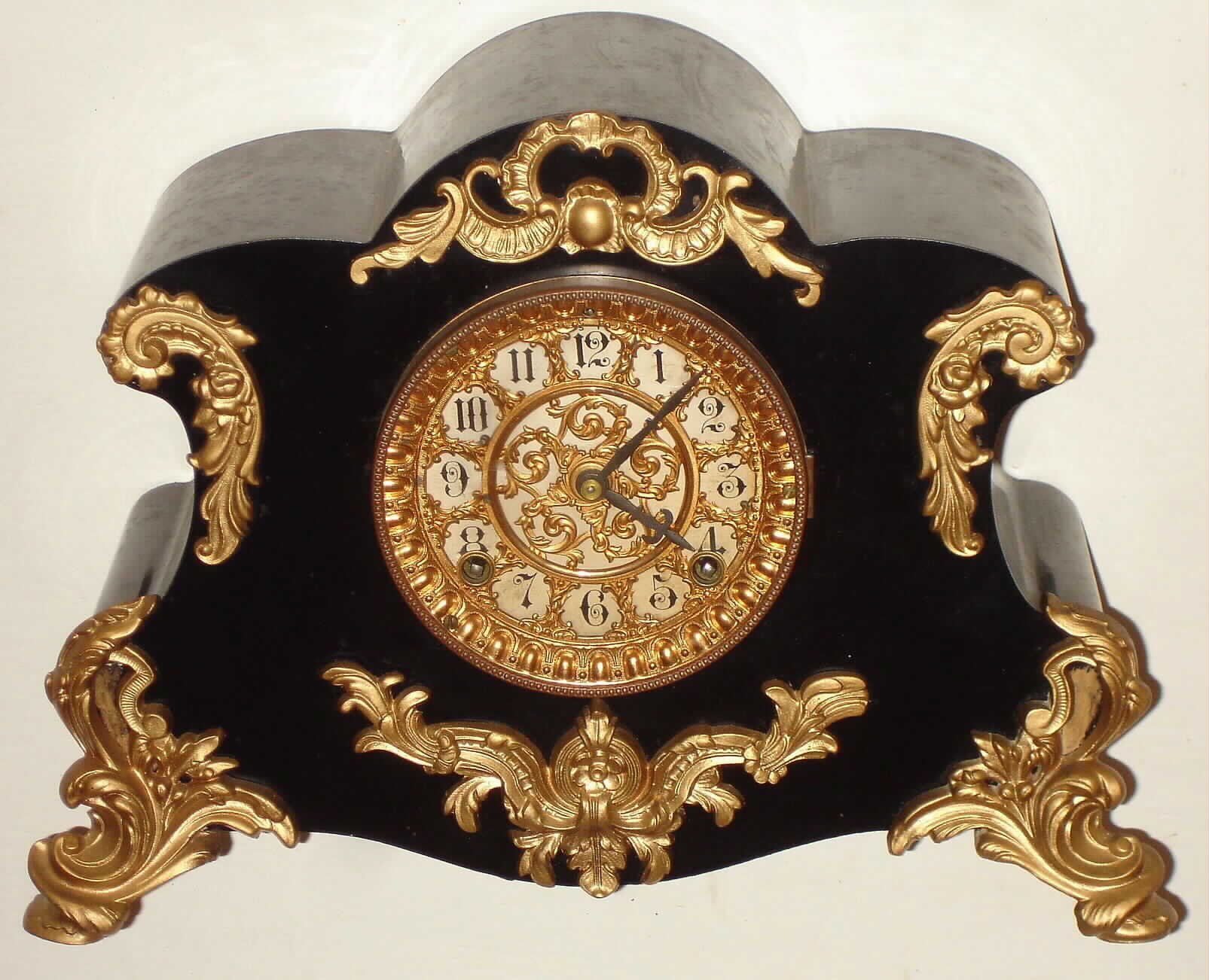 Ansonia Clock Co., New York, "Amiens" 8-day time and strike enameled iron mantel clock, c1904 — Antique Clocks Price Guide