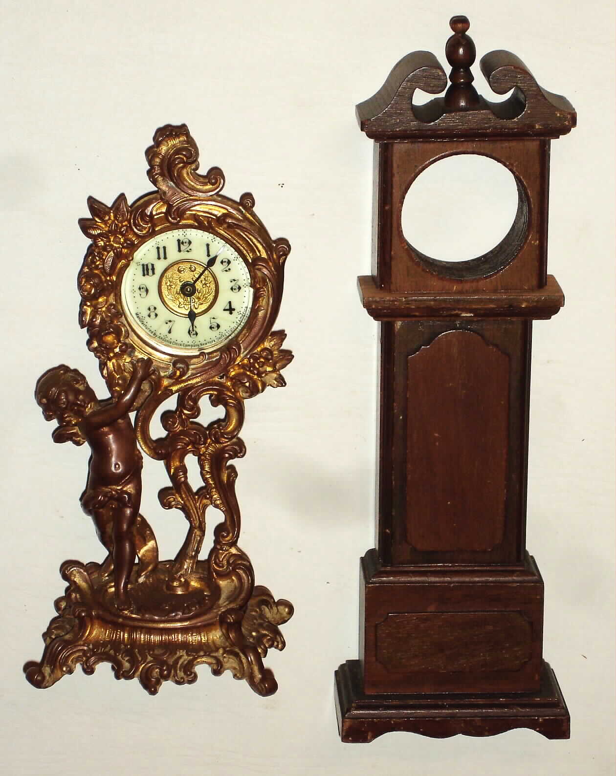 Ansonia Clock Co., New York, 30-hour cast metal novelty timepiece c1900, plus miniature wood long case — Antique Clocks Price Guide