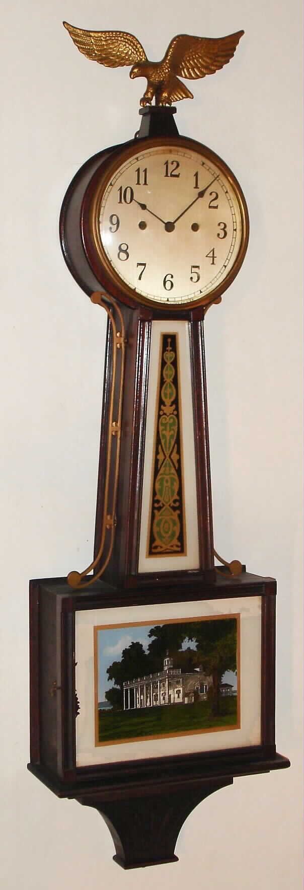 New Haven Clock Co., New Haven, Conn., "Willard" 30-day mahogany banjo timepiece, c1929 — Antique Clocks Price Guide