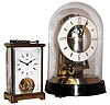 Clocks- 2 (Two) German brass and glass novelty clocks, Kundo Electronic and Schatz carriage, later 20th century