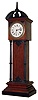French, 30 hour ebony and oak miniature timepiece in the form of a tall clock, c1910