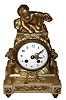 French figural mantel clock with 8 day, time and bell strike, spring driven movement in a gilded brass /ormolu case on white marble base all resting on four brass feet with white enamel dial, c1890