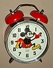 Mickey Mouse mechanical alarm clock automaton with Mickey's hands indicating the hours and minutes and his head ticking, licensed by Walt Disney Productions copyright 1977, made in France and new old stock, c1977