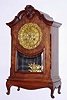 Japy Freres, French mantel clock, 8 day, time and gong strike, spring driven movement in mahogany case in the form of a wardrobe with case brass dial, c1870