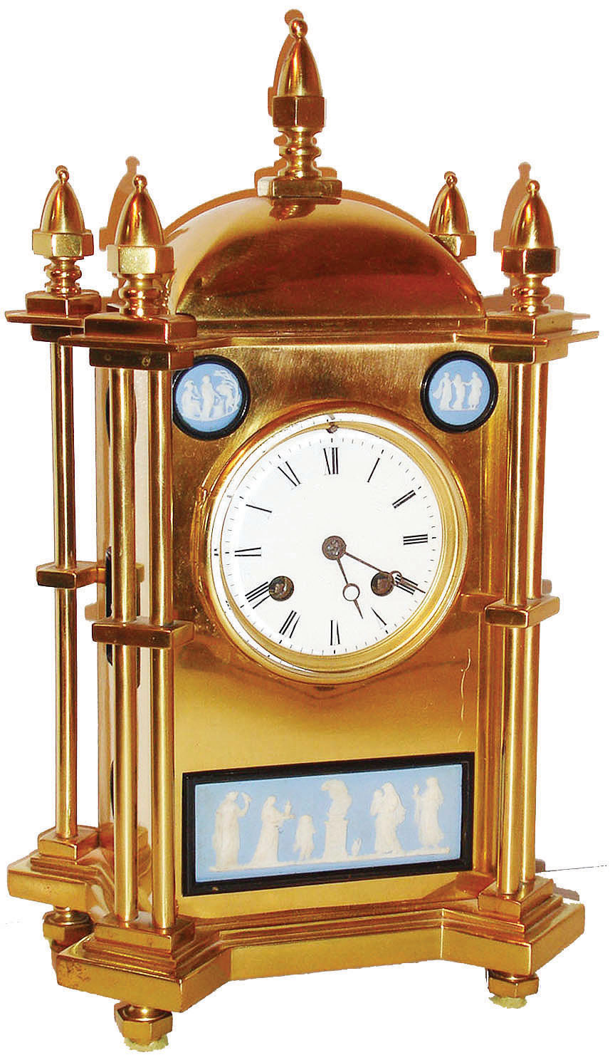 France, probably for the English market, a brass Gothic style mantel clock set with signed Wedgwood plaques, Japy Freres eight day time and strike, movement, white enamel Roman numeral dial, Breguet style hands, bezel with beveled glass, polished brass case with columned corners, topped by acorn form finials, set with blue signed Wedgwood jasper plaques decorated with classical and allegorical motifs, each set in its own black painted, metal frame c1860 — Antique Clocks Price Guide