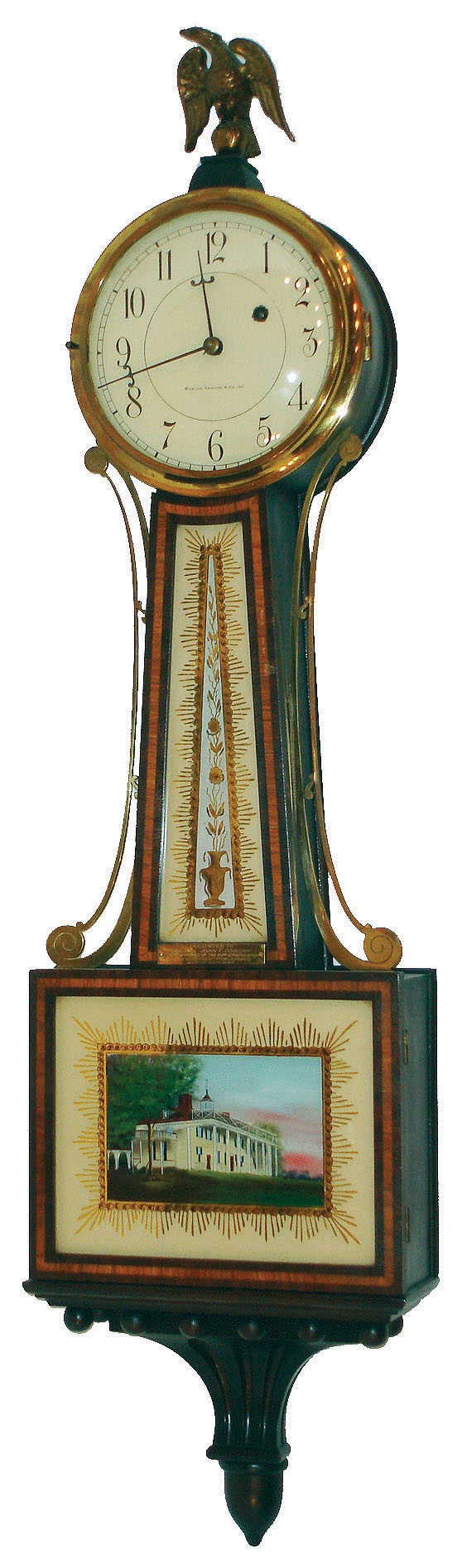 E. Howard &amp; Co., Boston, Mass., 8 day, weight patent or banjo timepiece, for Bigelow, Kennard &amp; Co, c1925  This clock was given as a gift with brass plaque that reads: "Presented to Colonel John F. Osborn by the officers of the 101st Engineers on his retirement from command March 24th, 1927" — Antique Clocks Price Guide