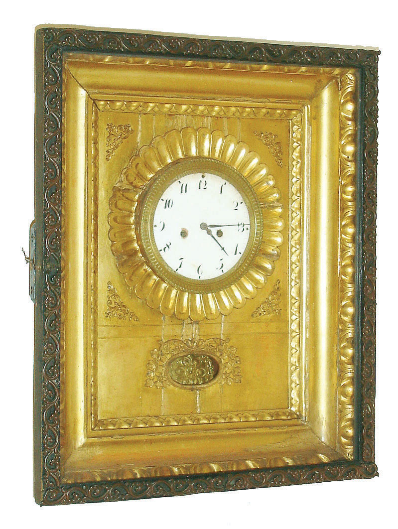 Austria, Ramenuhr or picture frame clock, the gilt frame with egg and dart molding, brass engine turned bezel with gilt petal carved surround, applied brass ornament at aperture for pendulum,  Roman numeral white enamel dial with blued steel hands, 2 train brass movement of two day duration, hour and half hour strike on a gong, fancy pressed brass pendulum with silk thread suspension, c1830 — Antique Clocks Price Guide