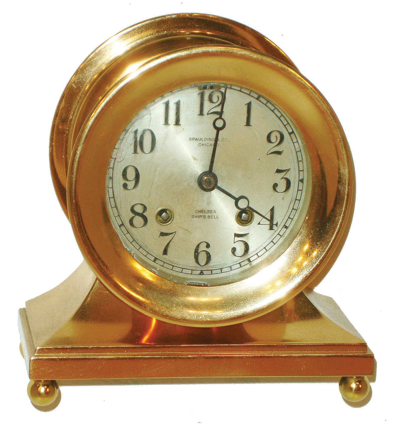 Chelsea Clock Co., Boston, "Commodore" or "Base and Ball" cast brass 4.5" dial 8 day ship's bells mantel clock, retailed by Spaulding &amp; Co., Chicago, 1919 — Antique Clocks Price Guide