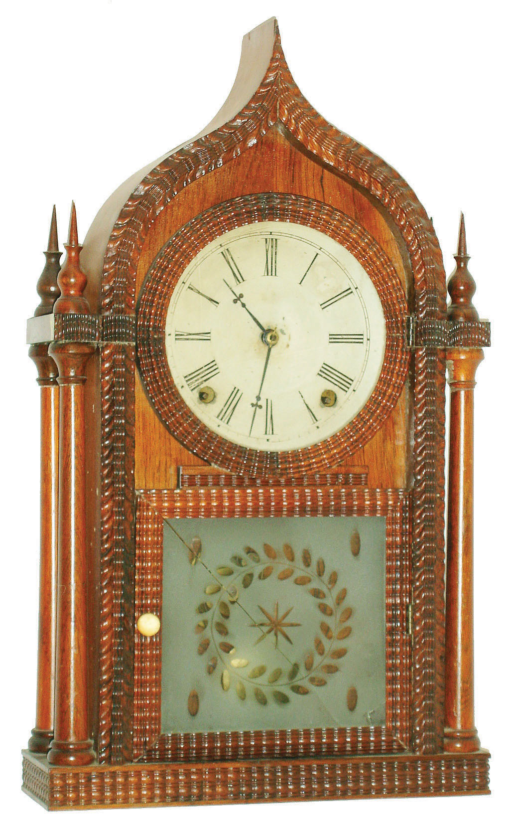Forestville Manufacturing Company, 8 day, time and strike ripple molding round gothic or onion top shelf clock. c.1845. — Antique Clocks Price Guide