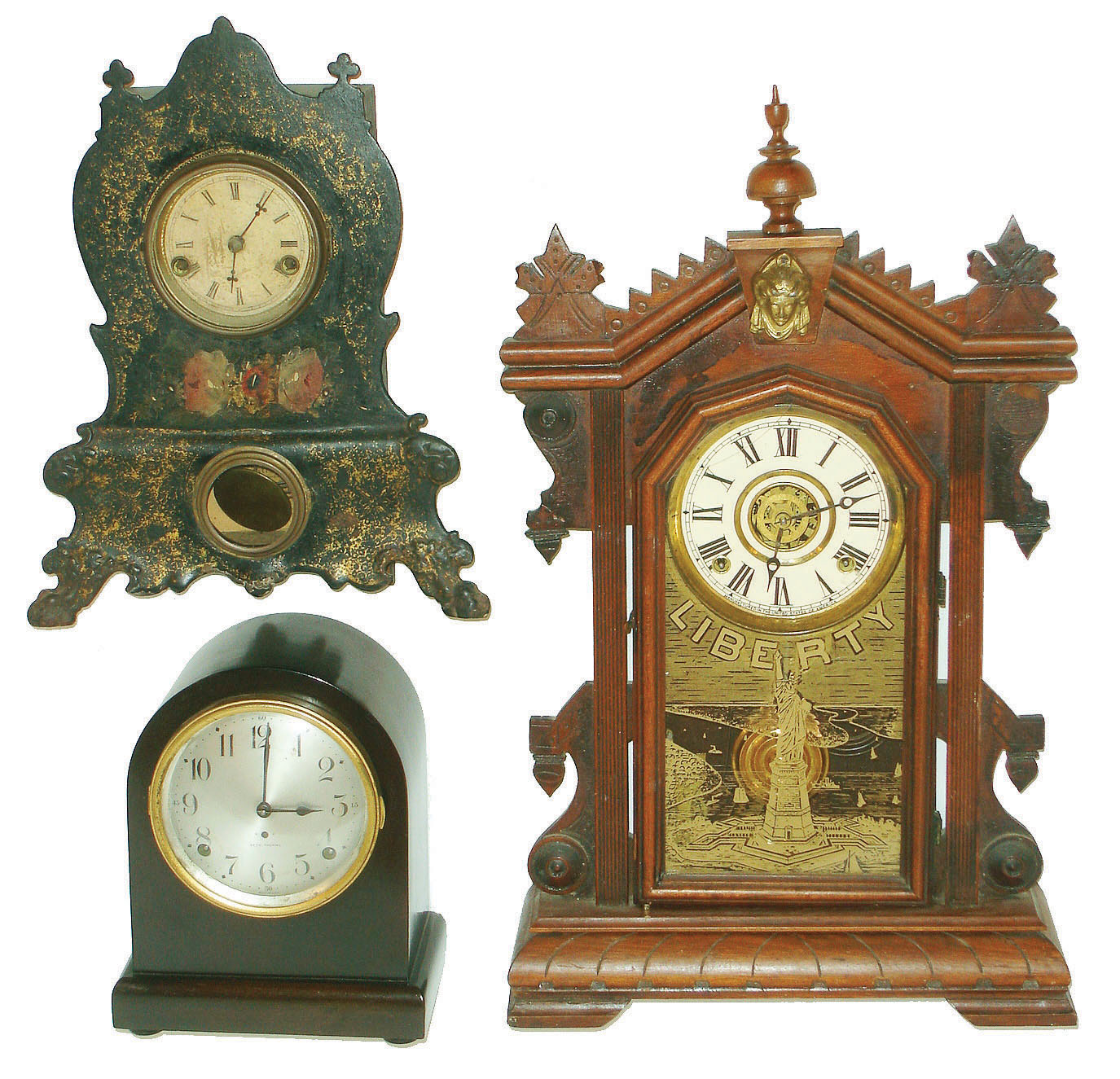 Clocks- 3 (Three): a small Seth Thomas time and strike, an Ingraham walnut shelf clock and a small American Clock Co iron front — Antique Clocks Price Guide