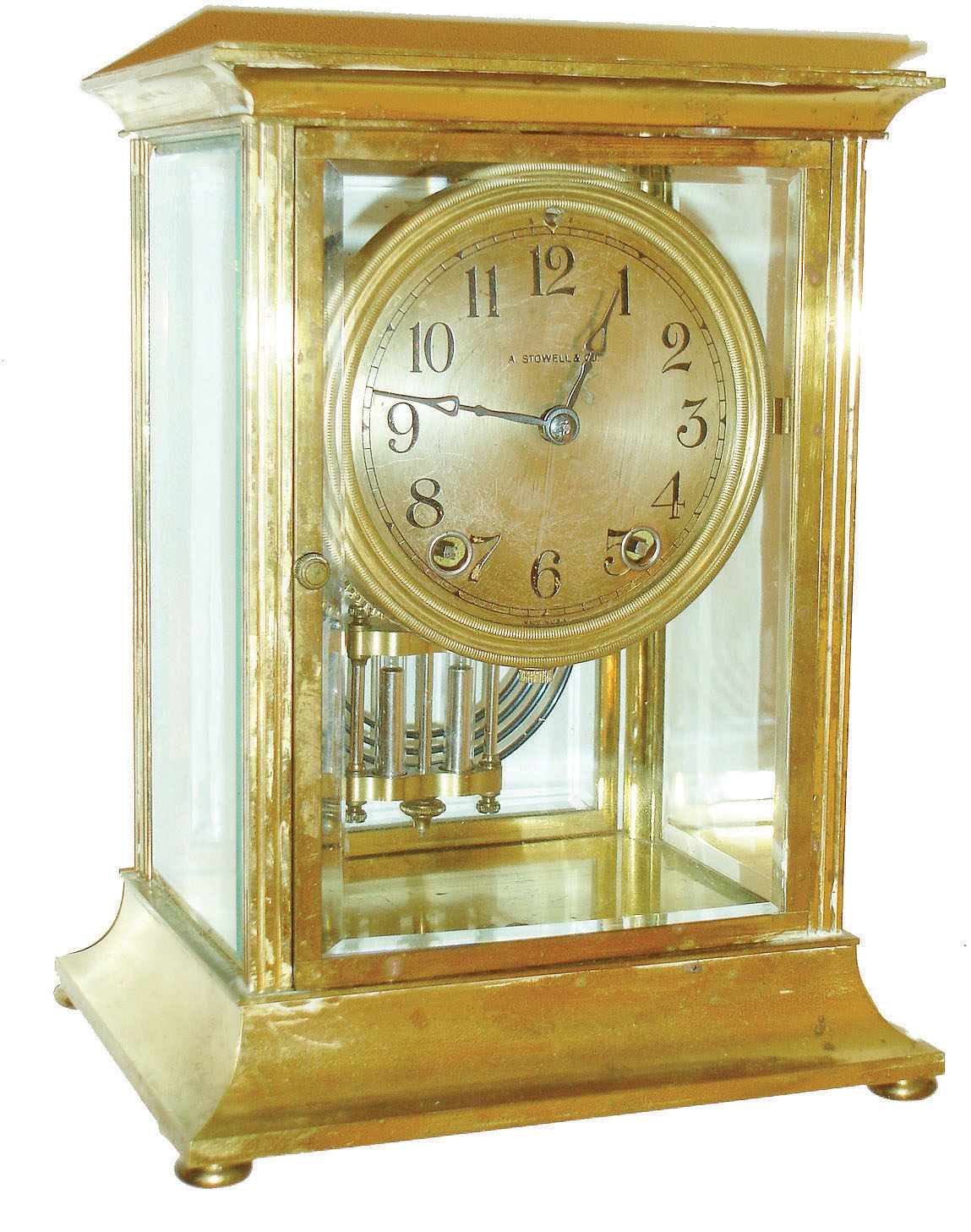 Seth Thomas Clock Co., Thomaston, Conn., for A. Stowell &amp; Co., crystal regulator, "Empire No. 303", Arabic numeral silvered dial, blued steel hands, round 8 day time and strike movement, with simulated mercury pendulum, c1920 — Antique Clocks Price Guide