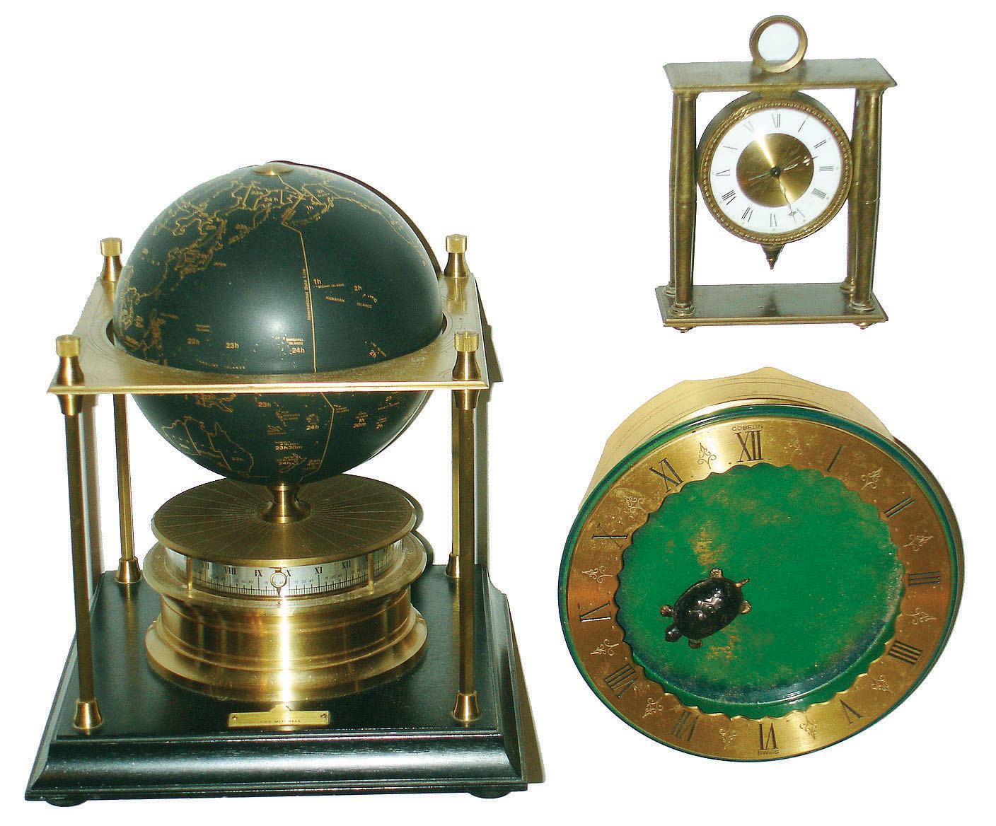 Clocks- 3 (Three) modern brass 8 day novelty and desk clocks: Gubelin floating turtle; 1979 annular globe clock from the Royal Geographical Society; Swiza Sheffield Swiss alarm clock; late 20th century — Antique Clocks Price Guide