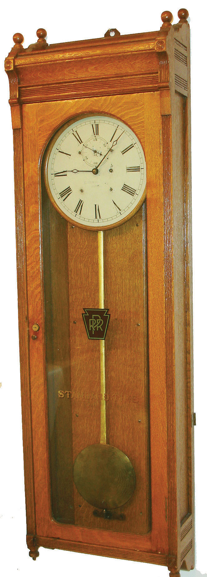 E. Howard &amp; Co., Boston, Mass., "No. 89 Regulator" wall clock, 8 days, time only, weight driven movement in an oak case with painted metal dial and PRR logo and STANDARD TIME on the glass, c1895 — Antique Clocks Price Guide